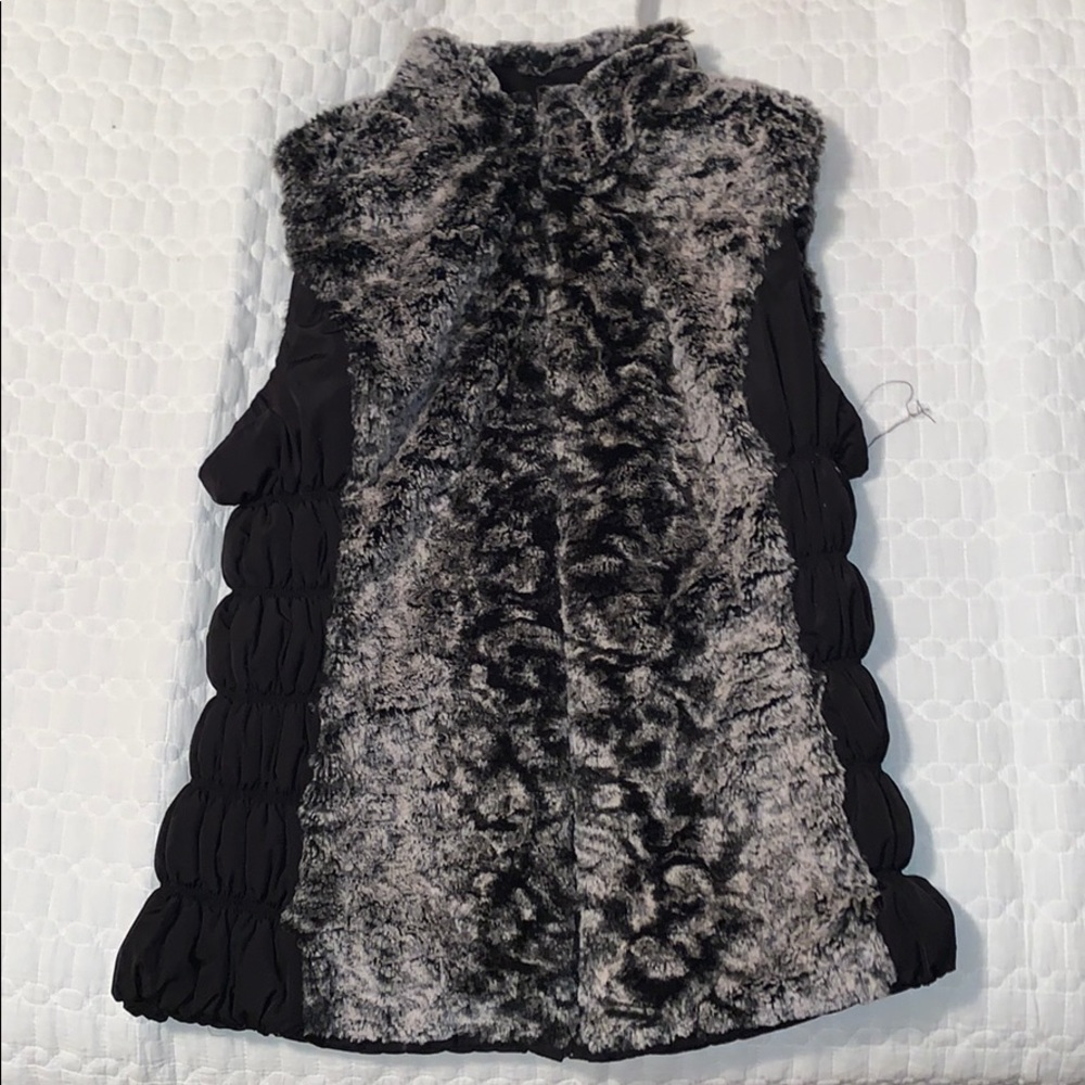 Fuzzy full zip vest.